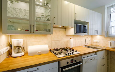 Viewpoint Tower: Cabinetry, Countertop, Property, Furniture, Kitchen Appliance, Kitchen Stove, Gas Stove, Kitchen, Drawer, Wood