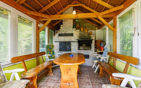 Julia: Furniture, Property, Table, Wood, Lighting, Interior Design, Living Room, Porch, Floor, Building