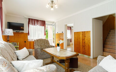 Kaiser: Property, Furniture, Table, Picture Frame, Comfort, Couch, Interior Design, Wood, Living Room, Orange