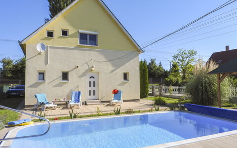 Sunny Day: Swimming Pool, Residential Area, House, Resort, Human Settlement, Cottage, Leisure, Estate, Villa, Backyard