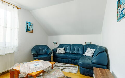 Renata: Couch, Property, Furniture, Table, Picture Frame, Azure, Wood, Window, Interior Design, Lighting