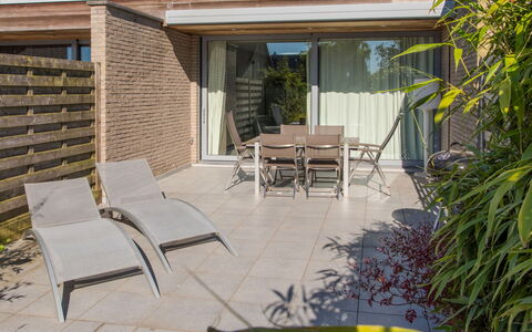 Stella Maris with Garage and Garden: Furniture, Plant, Building, Chair, Shade, Road Surface, Outdoor Furniture, Interior Design, Outdoor Table, Neighbourhood