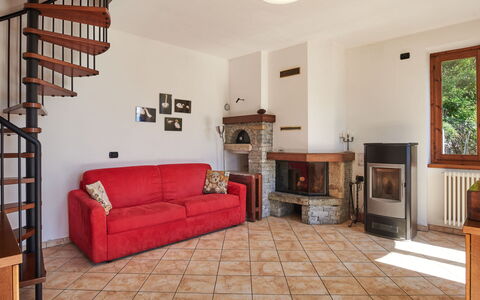 Ronco: Furniture, Picture Frame, Property, Plant, Couch, Wood, Window, Houseplant, Lighting, Interior Design