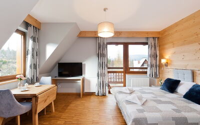 Lipki Park Resort 900.1: Table, Furniture, Building, Azure, Wood, Comfort, Lamp, Flooring, Cabinetry, Living Room