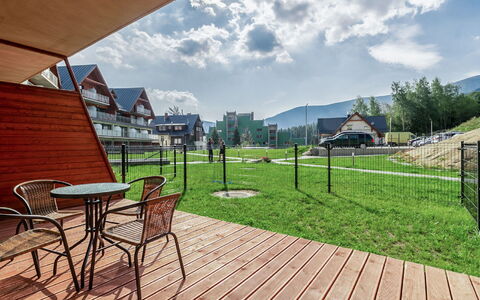 Triventi Mountain Residence: Cloud, Sky, Furniture, Table, Plant, Chair, Building, Shade, Wood, Tree