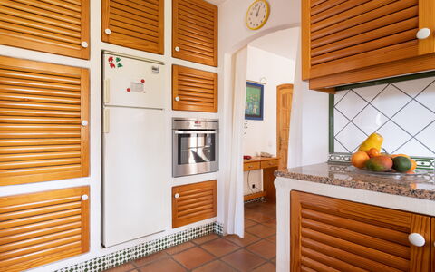 Finca Ingala: Property, Cabinetry, Building, Orange, Interior Design, Wood, Lighting, Home Appliance, Kitchen, House