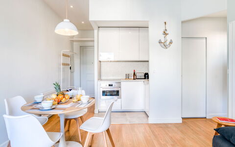 Villa Brillante: Furniture, Table, Property, Cabinetry, Wood, Countertop, Orange, Interior Design, Chair