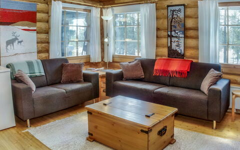 Vuosselin Kuukkeli: Furniture, Interior Design, Couch, Flooring, Wood, Living Room, Floor, Room, Home, Wood Flooring
