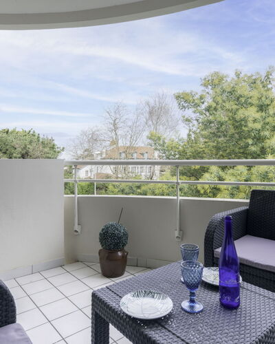 Les Terrasses du Golf: Sky, Furniture, Property, Table, Cloud, Tableware, Chair, Building, Shade, Architecture