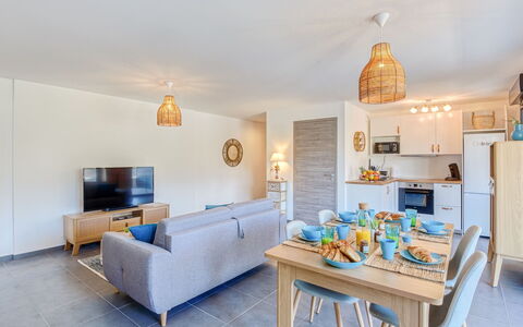 Paesu Pimpan: Table, Property, Furniture, Picture Frame, Couch, Blue, Azure, Orange, Lighting, Wood