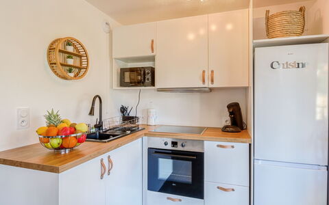 Paesu Pimpan: Cabinetry, Property, Countertop, Sink, Lighting, Kitchen, Interior Design, Home Appliance, Yellow, Kitchen Stove
