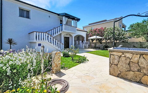 Tone: Residential Area, House, Home, Estate, Shade, Landscaping, Garden, Hacienda, Suburb, Flagstone