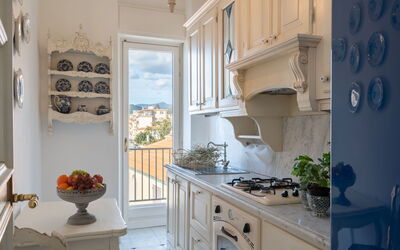 Pieds dans L'Eau 607.1: Cabinetry, Countertop, Property, Furniture, Plant, Blue, Azure, Kitchen, Wood, Houseplant