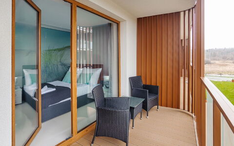 Resorts Kołobrzeg: Building, Furniture, Comfort, Plant, Wood, Shade, Interior Design, Flooring, Architecture