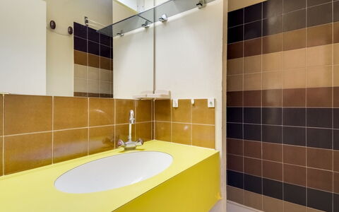 Les Jardins de la Plage: Bathroom, Property, Room, Tile, Interior Design, Architecture, Yellow, Wall, Tap, Building