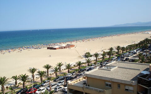 Soleil Bleu: Water, Sky, Daytime, Building, Azure, Natural Environment, Tree, Beach, Arecales, Coastal And Oceanic Landforms