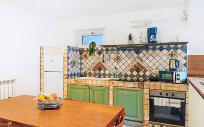 Residenza Agrifoglio 400.15: Flooring, Interior Design, Floor, Kitchen, Furniture, Tile, Room, Countertop, Ceiling, Kitchen Stove