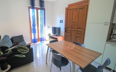 Residenza Agrifoglio 400.12: Table, Furniture, Property, Cabinetry, Comfort, Wood, Interior Design, Living Room, Building, Door