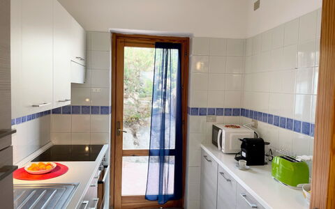 Turriga: Cabinetry, Building, Wood, Floor, Countertop, Flooring, Drawer, Home Appliance, Kitchen
