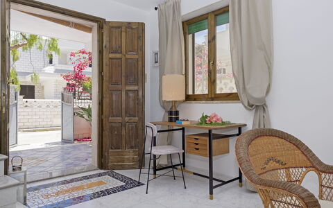 Villa Marlene: Table, Furniture, Building, Property, Window, Plant, Flower, Picture Frame, Chair, Interior Design