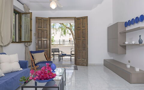 Villa Marlene: Table, Furniture, Property, Mirror, Blue, Interior Design, Chair, Cabinetry, Couch, Wood