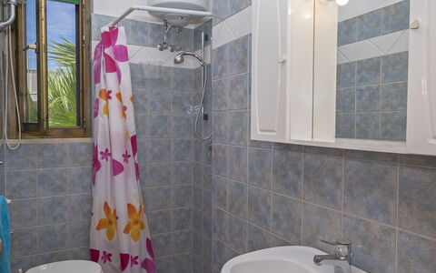Villa Marlene: Mirror, Sink, Plumbing Fixture, Property, Photograph, Tap, Bathroom Sink, Bathroom, Purple, Building