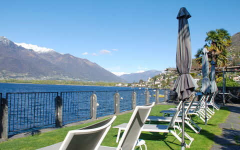App. Vira Lago 500 Ost - Eg: Sky, Water, Mountain, Property, Cloud, Azure, Nature, Outdoor Furniture, Plant, Body Of Water