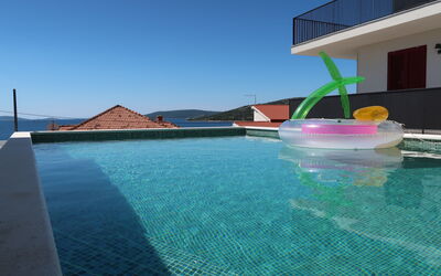 Trogir Vranjica 601: Water, Sky, Building, Azure, Swimming Pool, Body Of Water, House, Leisure, Aqua, Resort Town