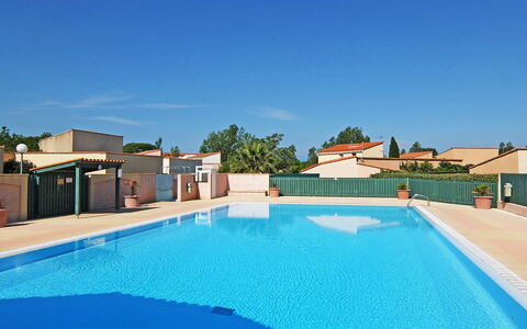 Le Hameau des Capellans: Water, Sky, Property, Swimming Pool, Building, Plant, Azure, Outdoor Furniture, Tree, Shade