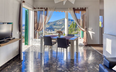 Casa Matilde - Villa Alle Cascine, Imperia: Property, Table, Blue, Building, Azure, Window, Wood, Interior Design, Living Room, Plant