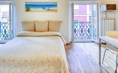 Studio Fede - Levanto: Furniture, Blue, Building, Comfort, Window, Azure, Wood, Textile, Bed Frame, Flooring