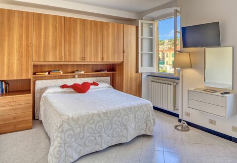 Studio Paola - Levanto: Furniture, Cabinetry, Comfort, Wood, Interior Design, Drawer, Building, Flooring, Bed, Floor