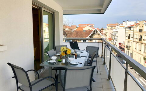 Neptune: Table, Furniture, Property, Countertop, Tableware, Cabinetry, Food, Plant, Window, Chair