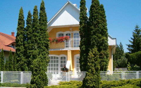 Thuja: Plant, Sky, Building, Window, Tree, Grass, Architecture, Land Lot, Woody Plant, Hedge