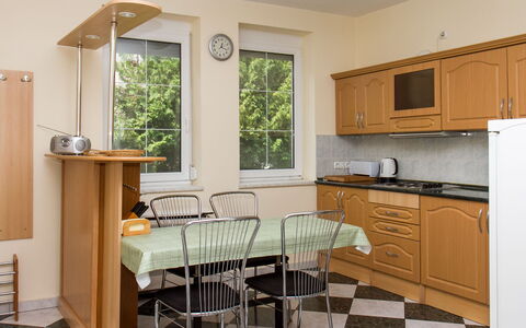 Leon: Cabinetry, Furniture, Table, Countertop, Property, White, Kitchen, Chair, Wood, Interior Design