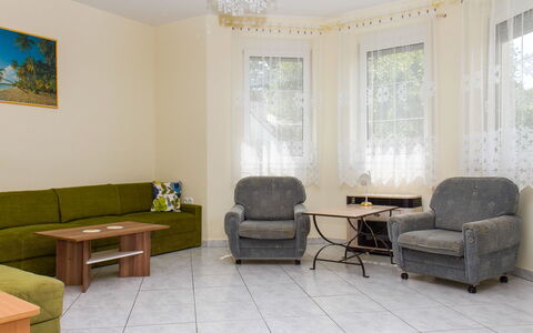 Leon: Furniture, Table, Building, Plant, Chair, Wood, Interior Design, Lighting, Shade, Comfort