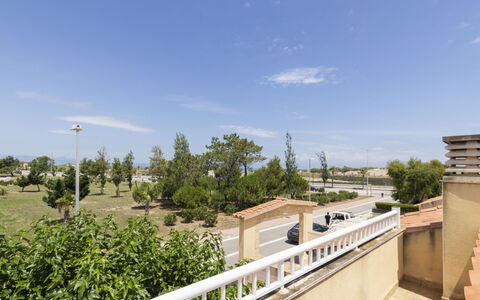 Fontibre: Sky, Cloud, Plant, Tree, Building, Street Light, Road Surface, Urban Design, Real Estate, Asphalt
