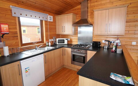 Loch Leven Lodge 11: Cabinetry, Countertop, Kitchen Appliance, Kitchen, Home Appliance, Kitchen Stove, Wood, Interior Design, Flooring, Floor
