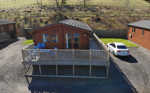Loch Leven Lodge 11: Car, Building, Window, Plant, Tree, House, Vehicle, Wood, Slope, Cottage