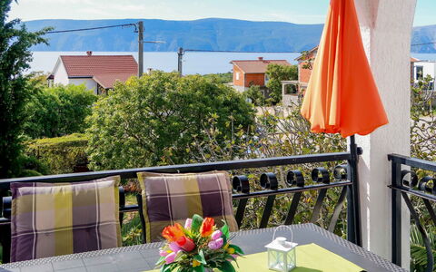 Krk Pinezići 602: Table, Sky, Flower, Property, Daytime, Building, Plant, Green, Tableware, Blue