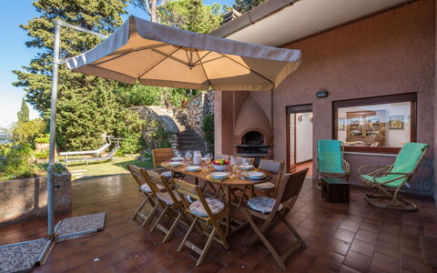Villa Lara: Table, Furniture, Property, Plant, Sky, Flowerpot, Chair, Building, Tree, Shade