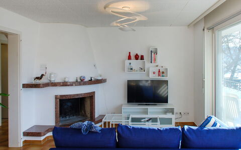San Quirico: Property, Couch, Picture Frame, Blue, Wood, Window, Interior Design, Lighting, Living Room, Building