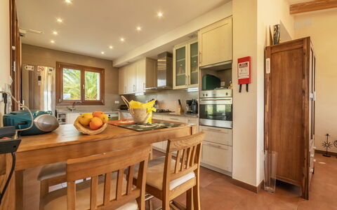 Son Bordoi: Table, Cabinetry, Furniture, Countertop, Tableware, Wood, Chair, Kitchen, Flooring, Interior Design