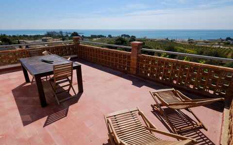 Pino: Sky, Property, Furniture, Water, Wood, Cloud, Shade, Outdoor Furniture, Architecture, Interior Design