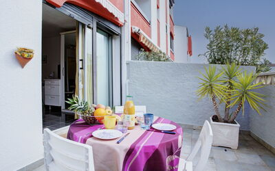 Saint Cyprien 250: Building, Property, Furniture, Tableware, Table, Window, Interior Design, Chair, Flowerpot, Sky