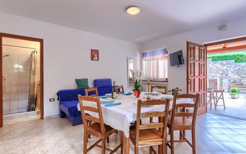 Vinka: Table, Furniture, Chair, Window, Wood, Houseplant, Interior Design, Floor, Flooring, Living Room