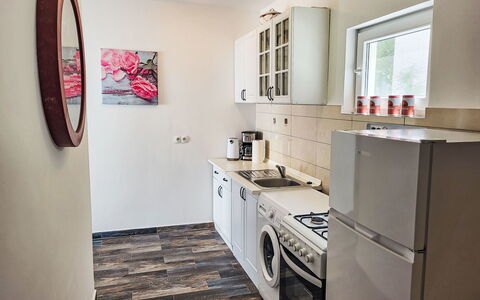 Matea: Countertop, Cabinetry, Wood, Picture Frame, Sink, Interior Design, Building, Flooring, Floor, Kitchen