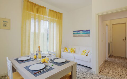 Manuela: Table, Window, Azure, Wood, Textile, Building, Interior Design, Architecture, Curtain