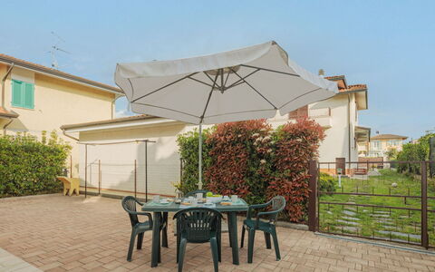 Manuela: Plant, Table, Sky, Furniture, Building, Shade, Botany, Outdoor Furniture, Architecture, Outdoor Table