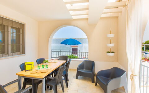 Case Pantanagianni: Furniture, Property, Table, Window, Chair, Azure, Shade, Plant, Wood, Interior Design